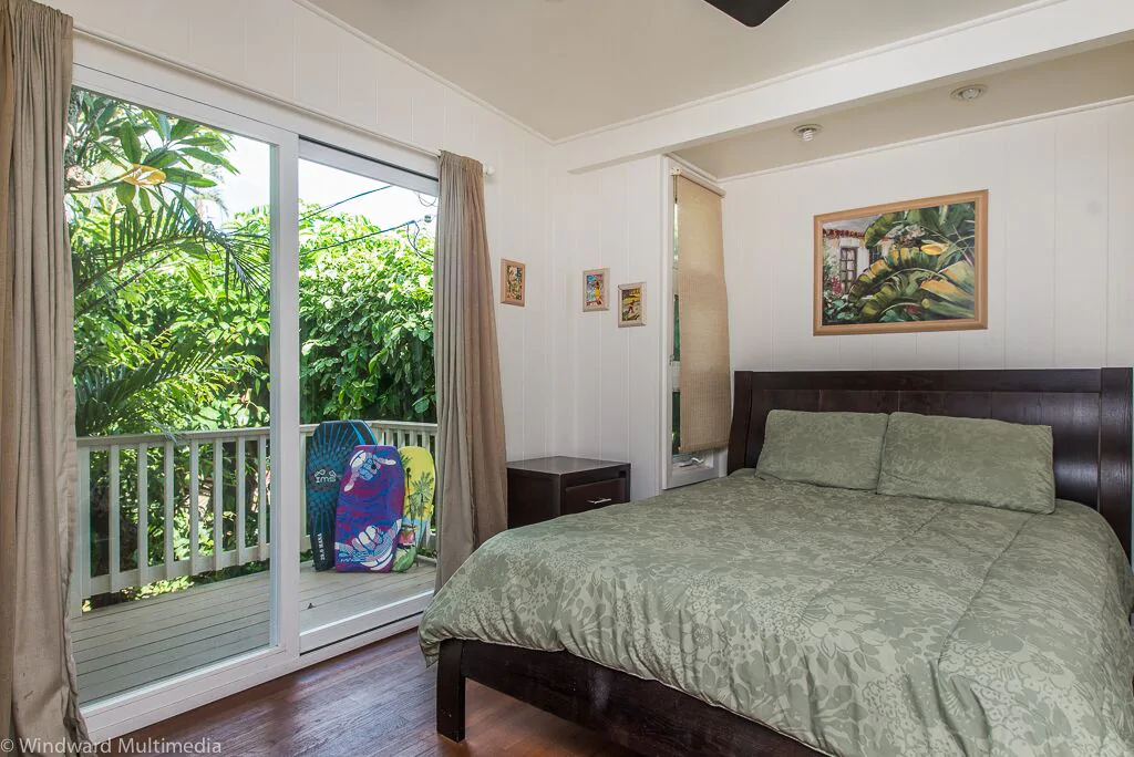 The second bedroom has a sliding door that leads to the terrace and yard.
