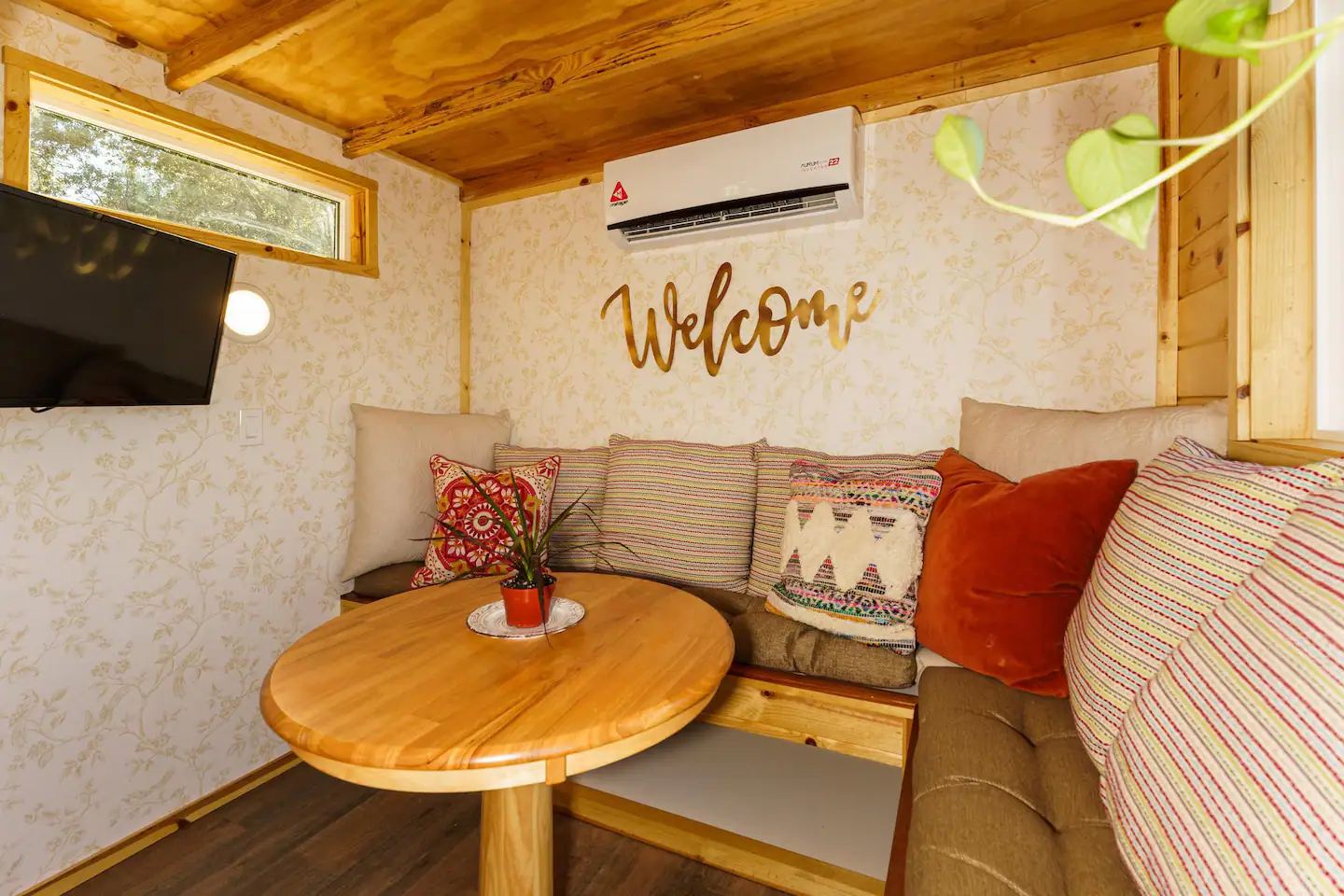 Mini split heating and cooling system in the living room to keep you comfy all year!