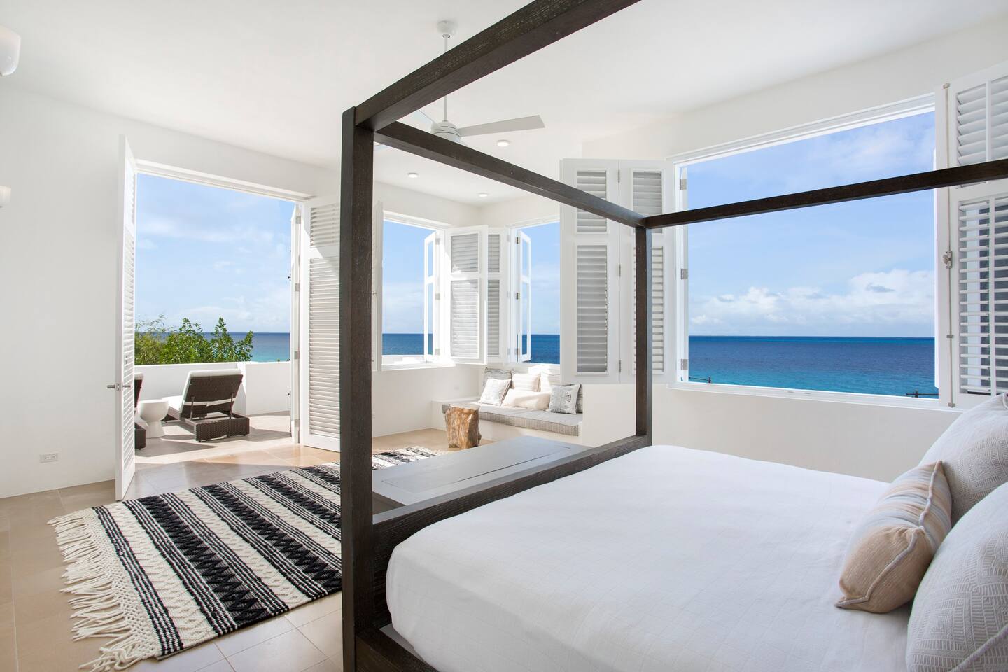 Serene and inviting bedroom in the villa, featuring comfortable furnishings, soft lighting, and a tranquil ambiance for ultimate relaxation.