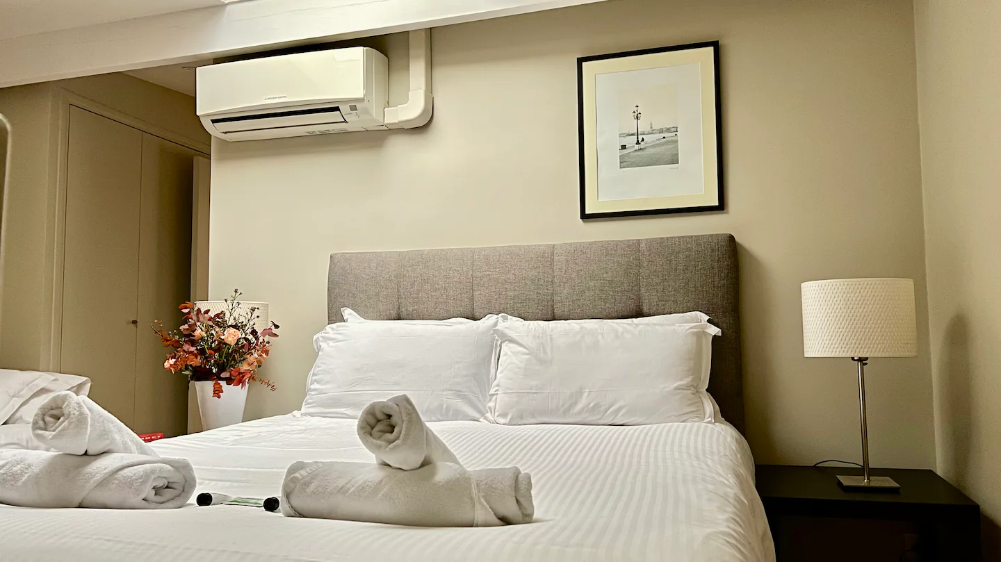 The bedroom's skylight (blackout blinds for restful sleep) offers views of the neighbouring St. Eustache Church.