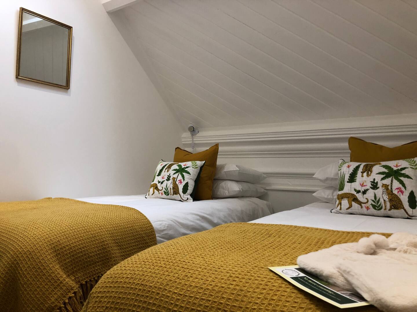 The Jungle Room. Twin beds/superking. Chest of drawers, hanging space. Hot water bottles.Smart tv, Amazon Dot.