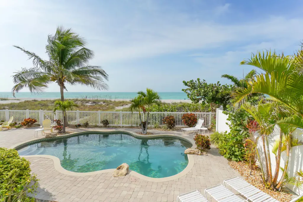 Heated pool right on the most beautiful beach.