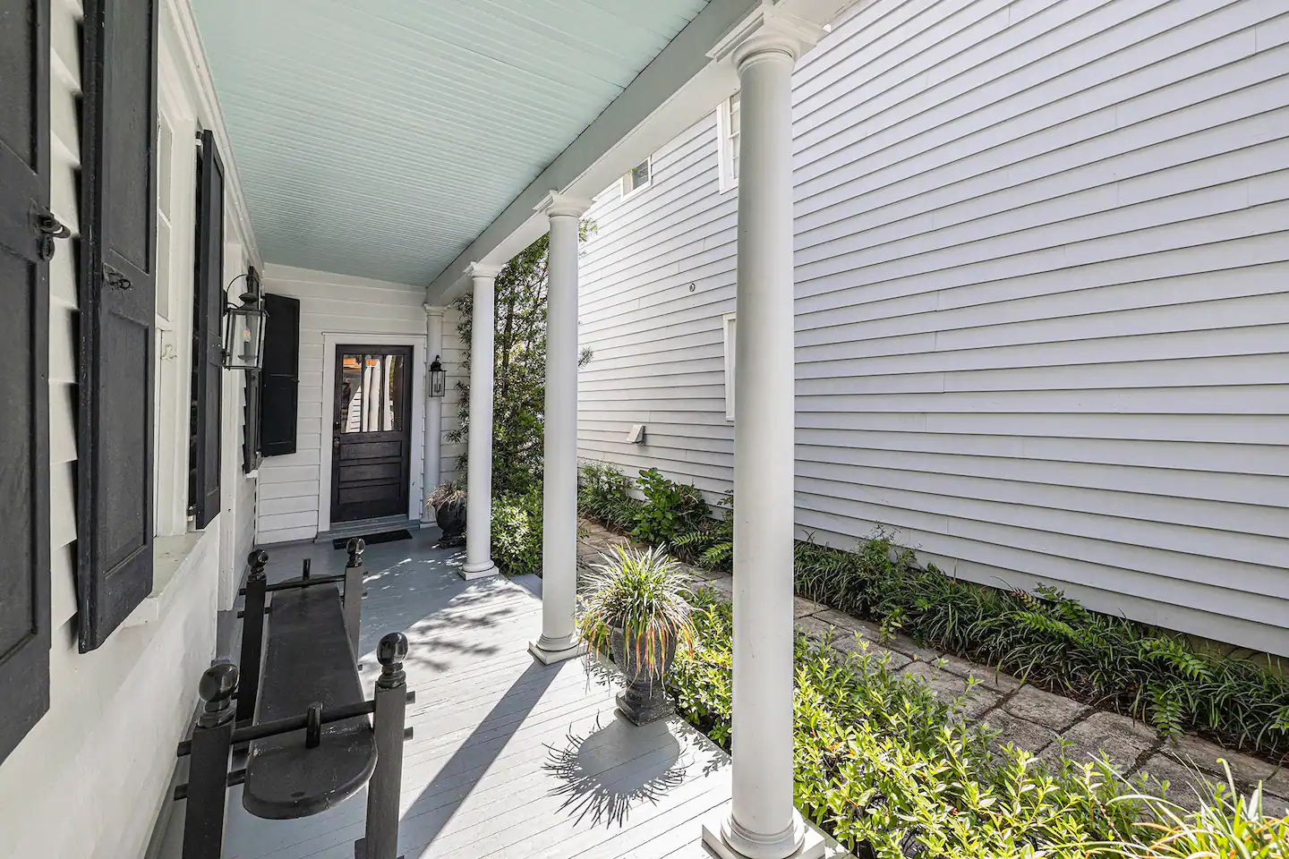 A "Charleston Single" style home built in the mid 1800's with modern amenities and awesome location!